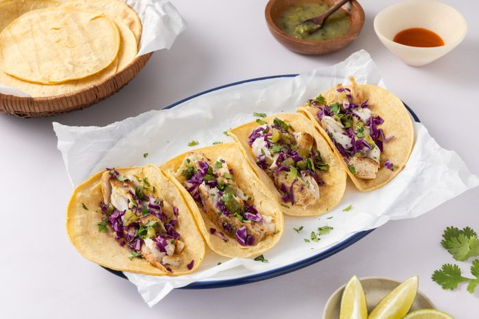 Mahi mahi tacos ready, on serving plate.