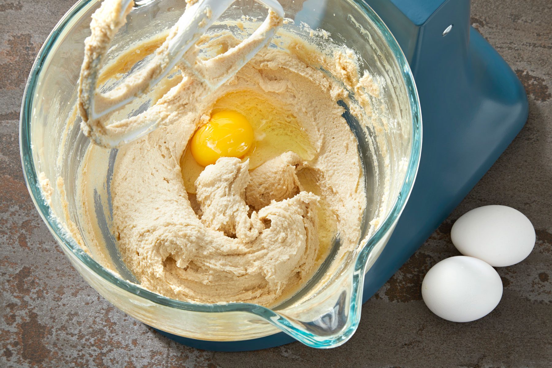 Eggs added to the butter and sugar mixture.