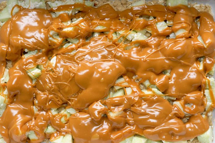caramel sauce drizzled over apples.