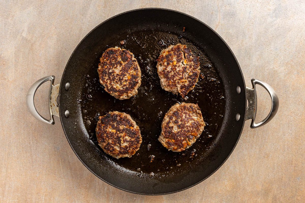 cooked patties in a skillet