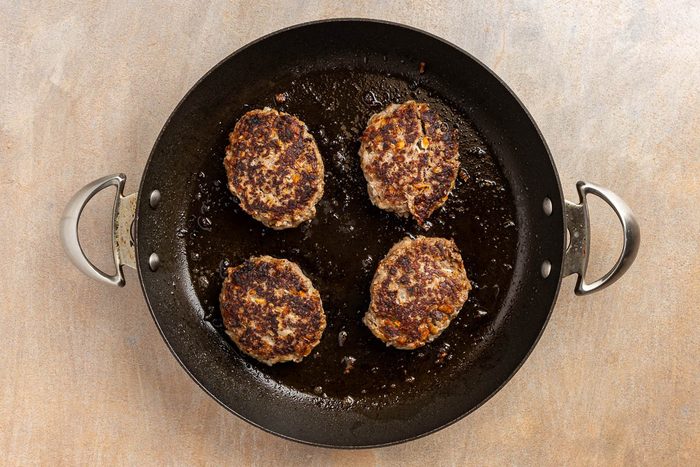 cooked patties in a skillet