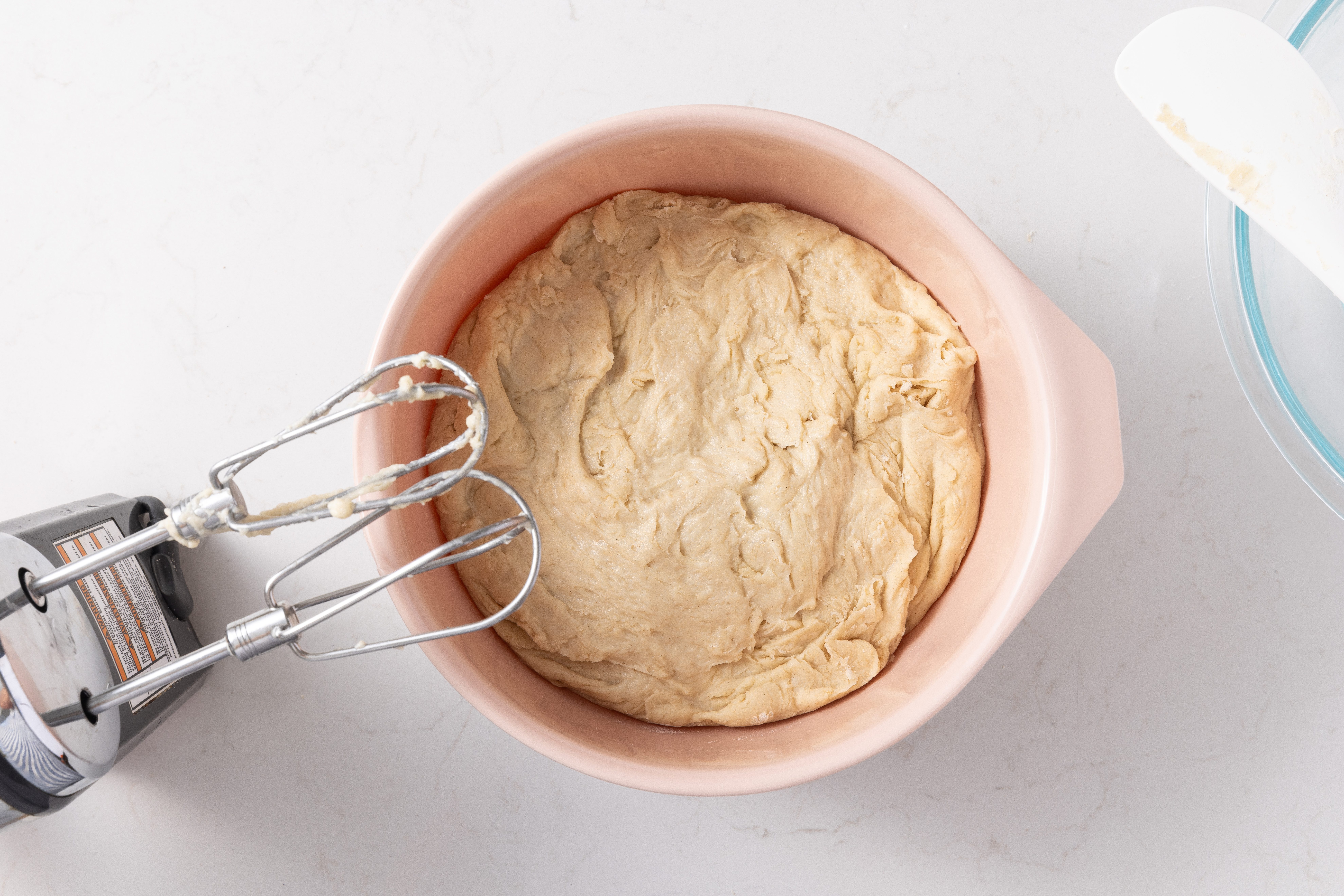 Dough for cinnamon rolls being mixed in.