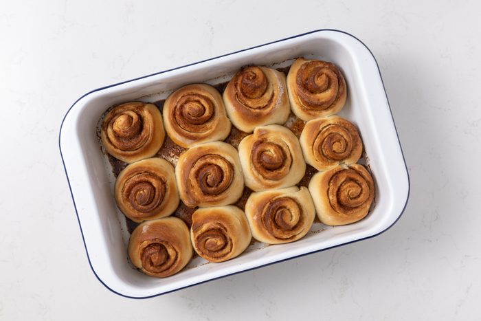 Cinnamon rolls baked and ready to be glazed.