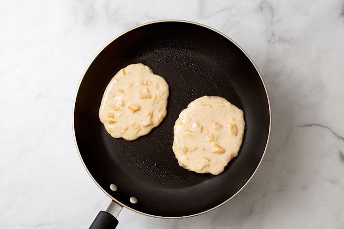 Heated pancake batter in large non-stick skillet