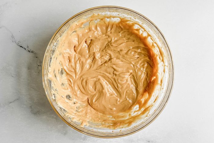 Ingredients for Taste of Home Peanut Butter Cake on a marble surface