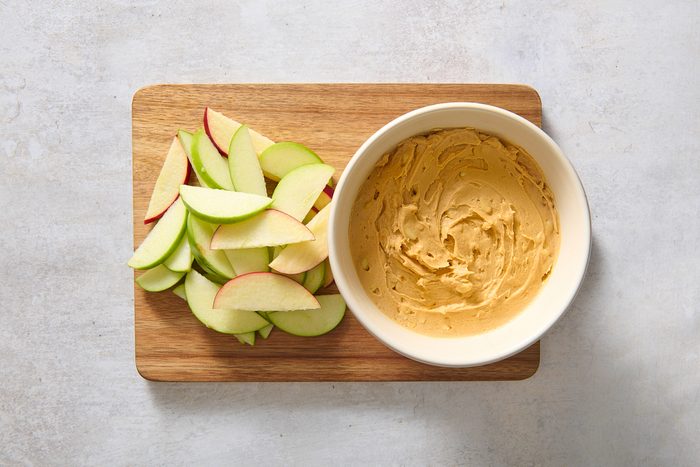 Serving the peanut butter dip with some apple slices