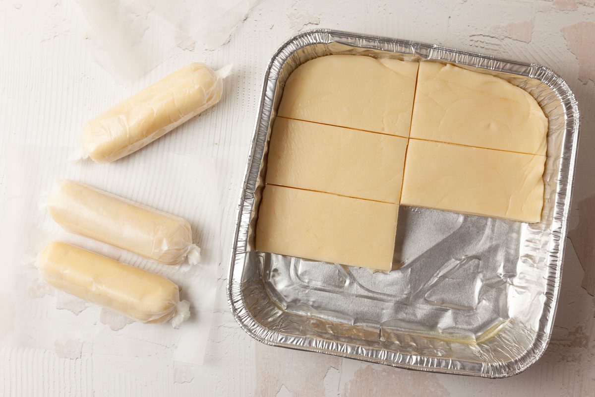 Step 4 of Taste of Home Pecan Logs is to cut the candy into four strips and then cut each strip in half. Shape each half into a log. Wrap the logs in waxed paper and twist the ends to keep them airtight. Refrigerate or freeze the logs until they’re firm