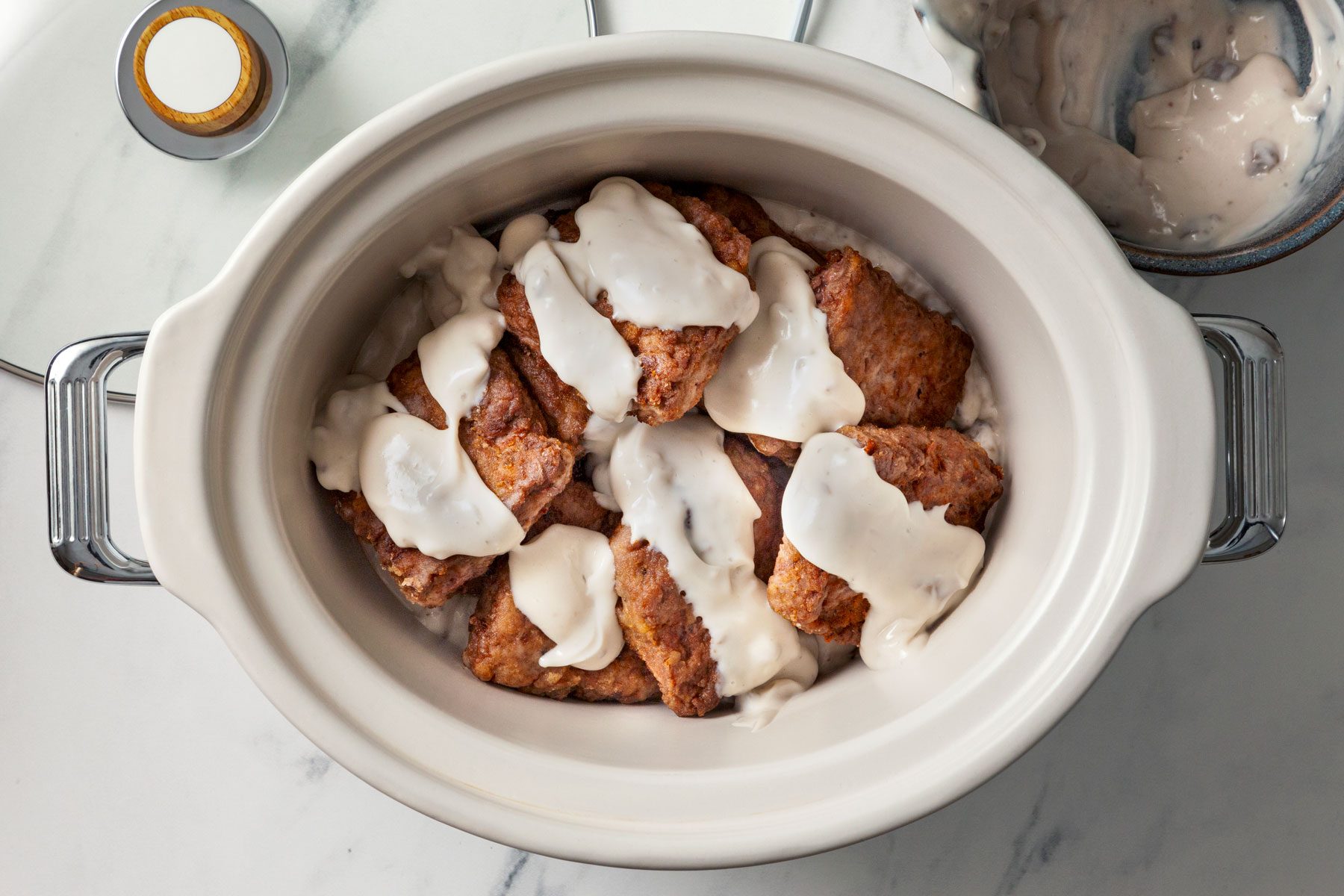 Steaks in a 3-quart slow cooker with soup.