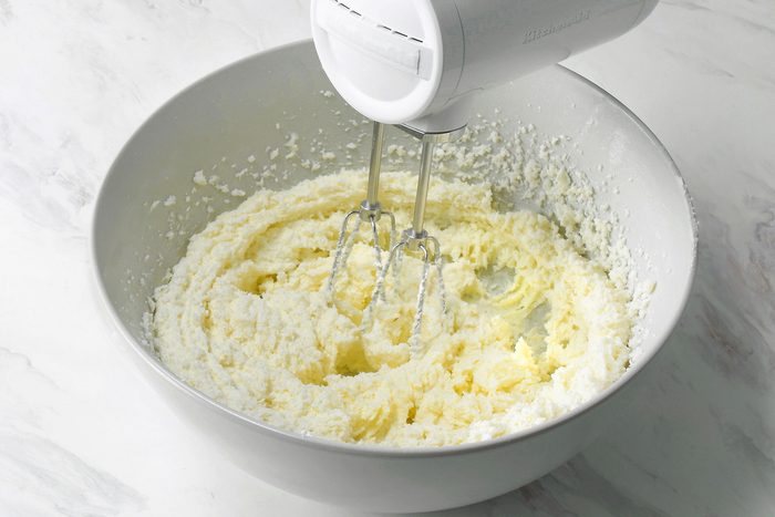 In a large bowl, cream butter and sugar beating until light and fluffy, using electric beater