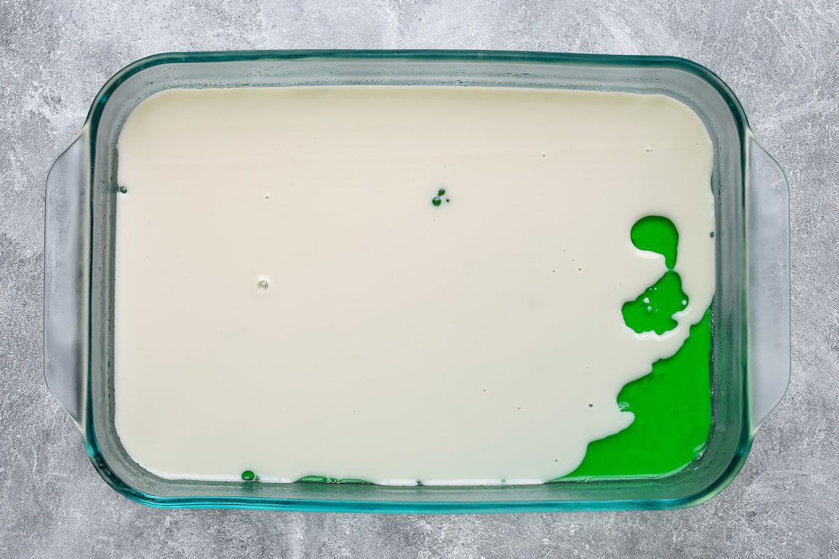 Taste of Home rainbow jello preparation, repeating layers of colorful jello and sweetened condensed milk.