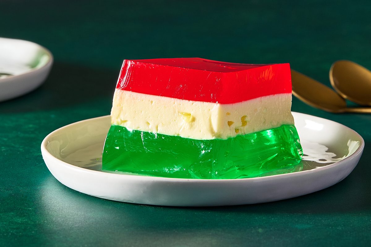Closeup shot of a square of ribbon jello on a plate