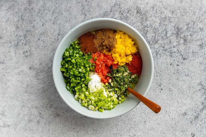 Taste of Home Roasted Salsa Recipe photo of all ingredients in a large bowl.