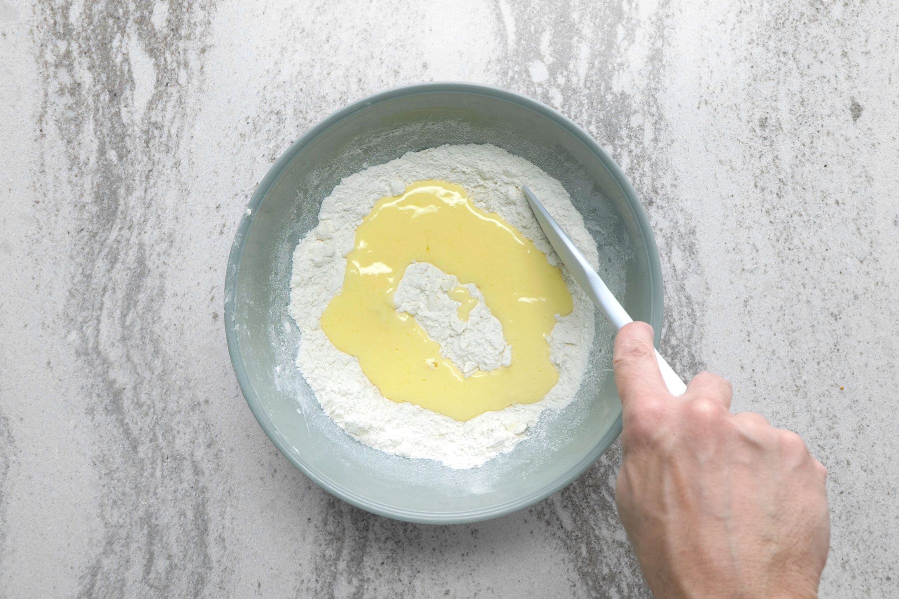 Buttermilk mixture added to the crumb mixture.