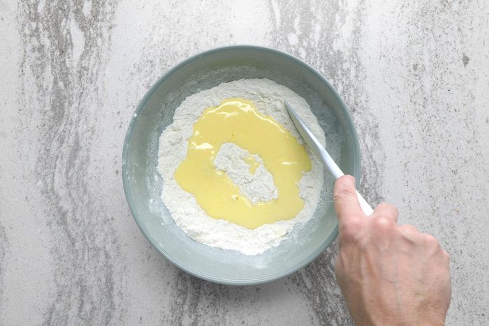 Buttermilk mixture added to the crumb mixture.