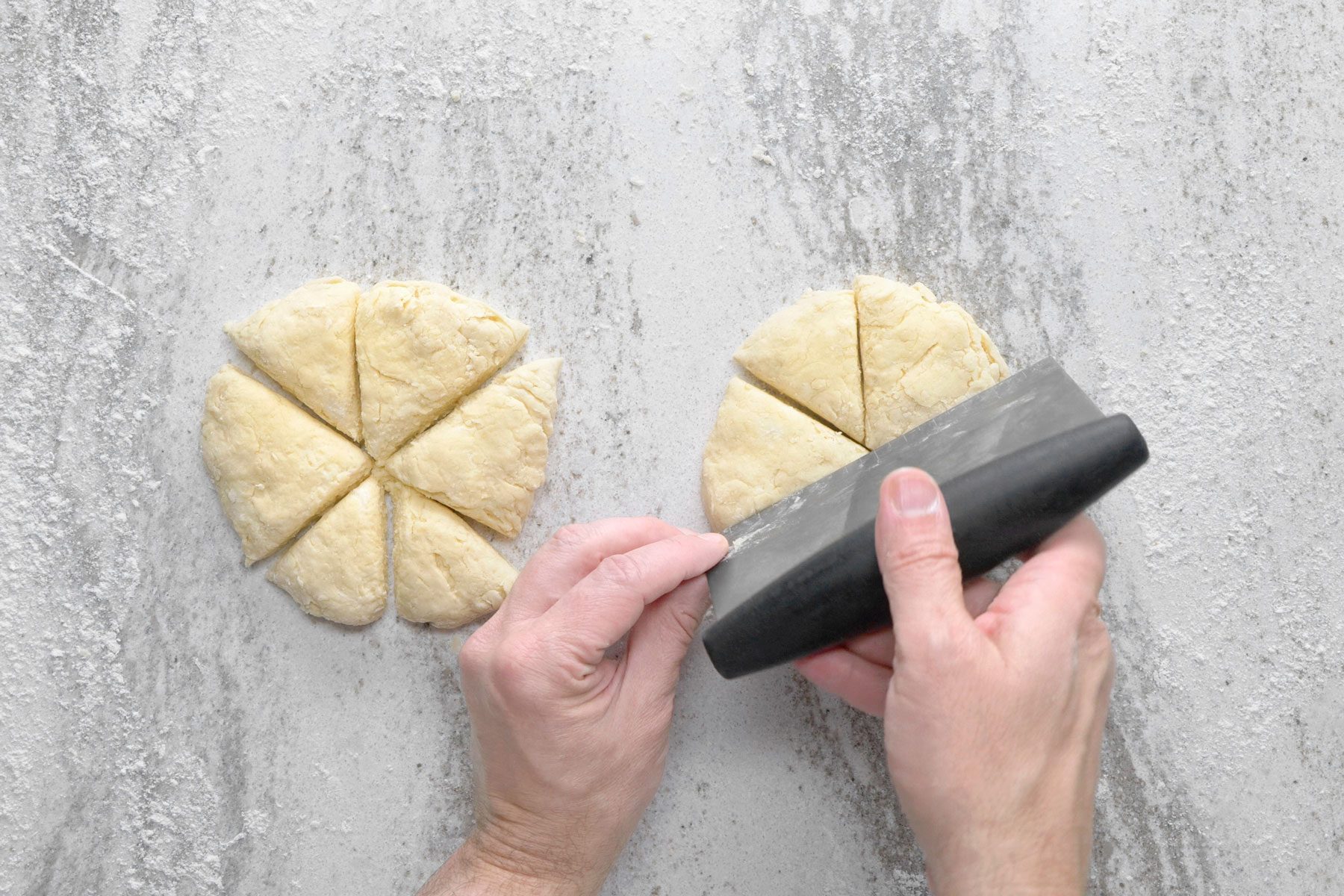 Kneaded dough divided into two five inch circles.