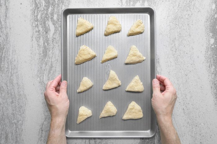 Dough wedges placed 1 inch apart on an ungreased baking sheet.