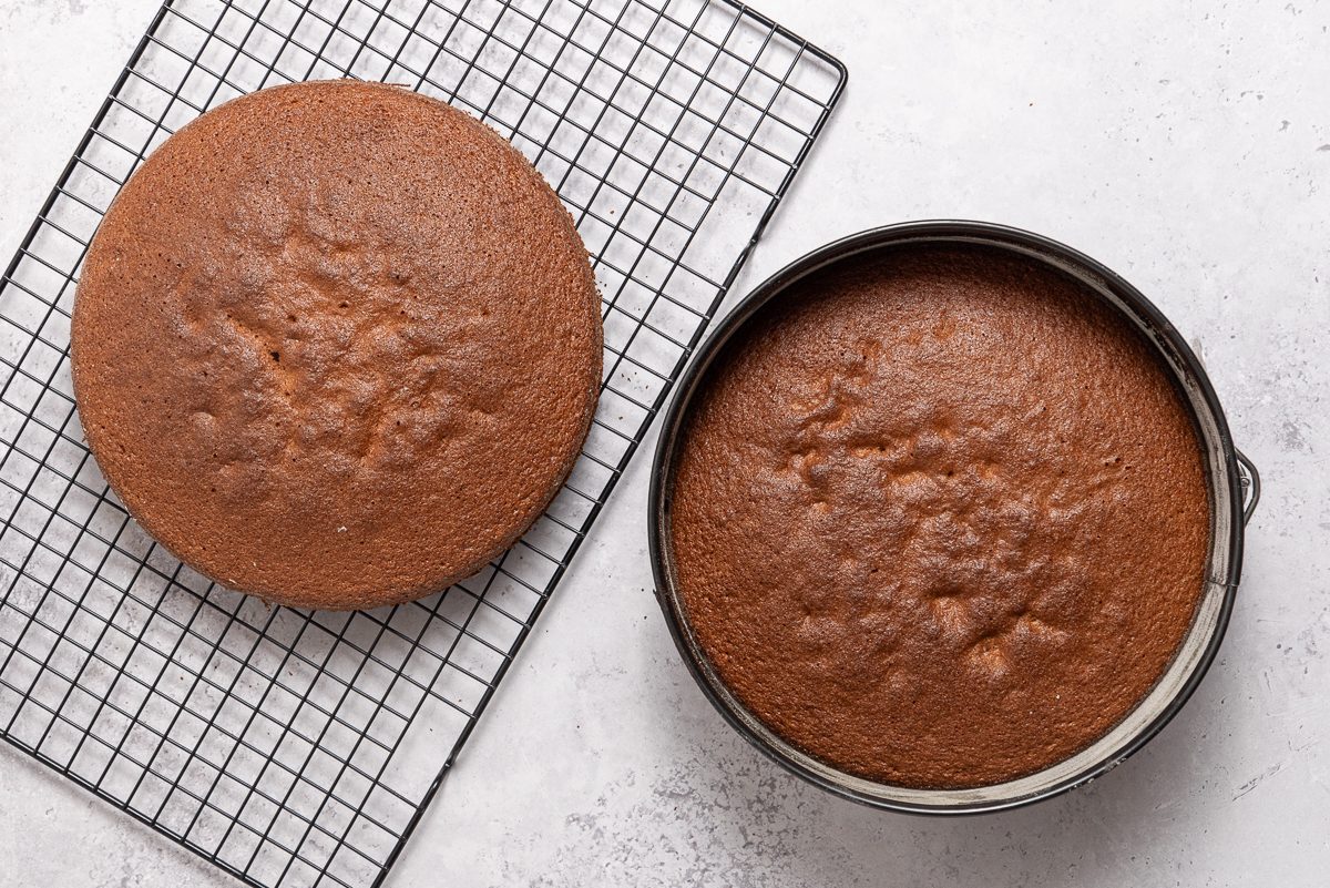 Cakes In Baking Pan And On Cooling Rack