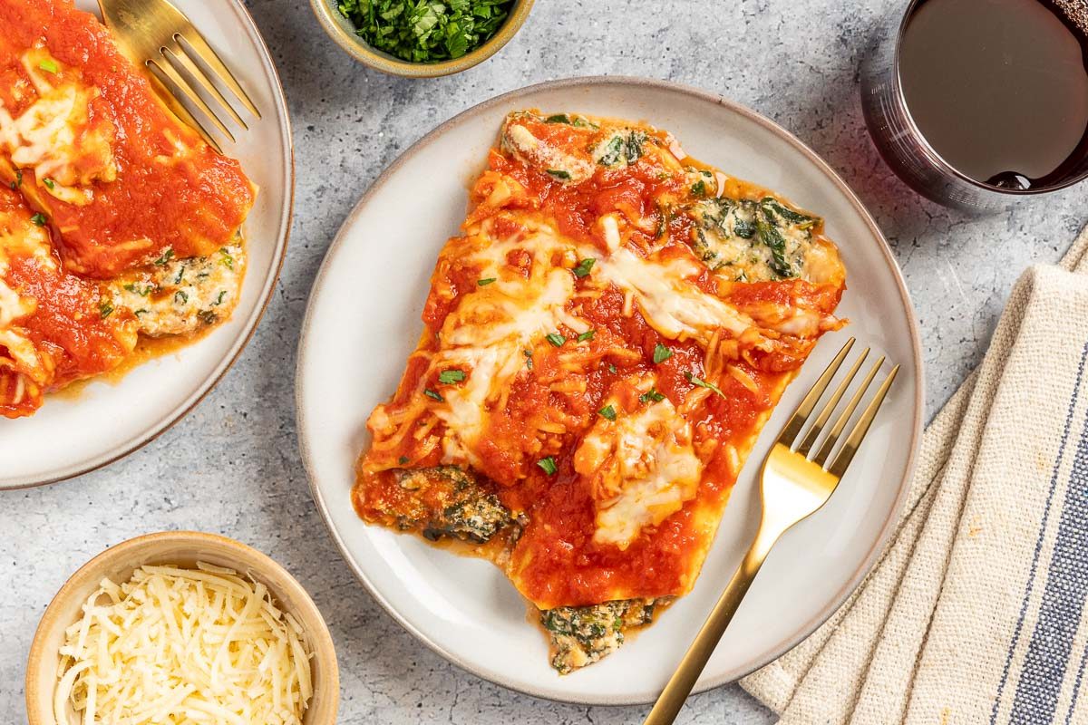 Taste of Home Spinach Manicotti recipe photo of the finished recipe portioned onto plates.
