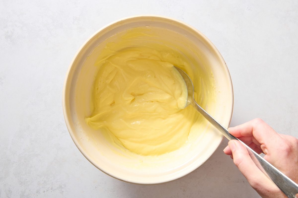 Folding in cream cheese and pudding mix