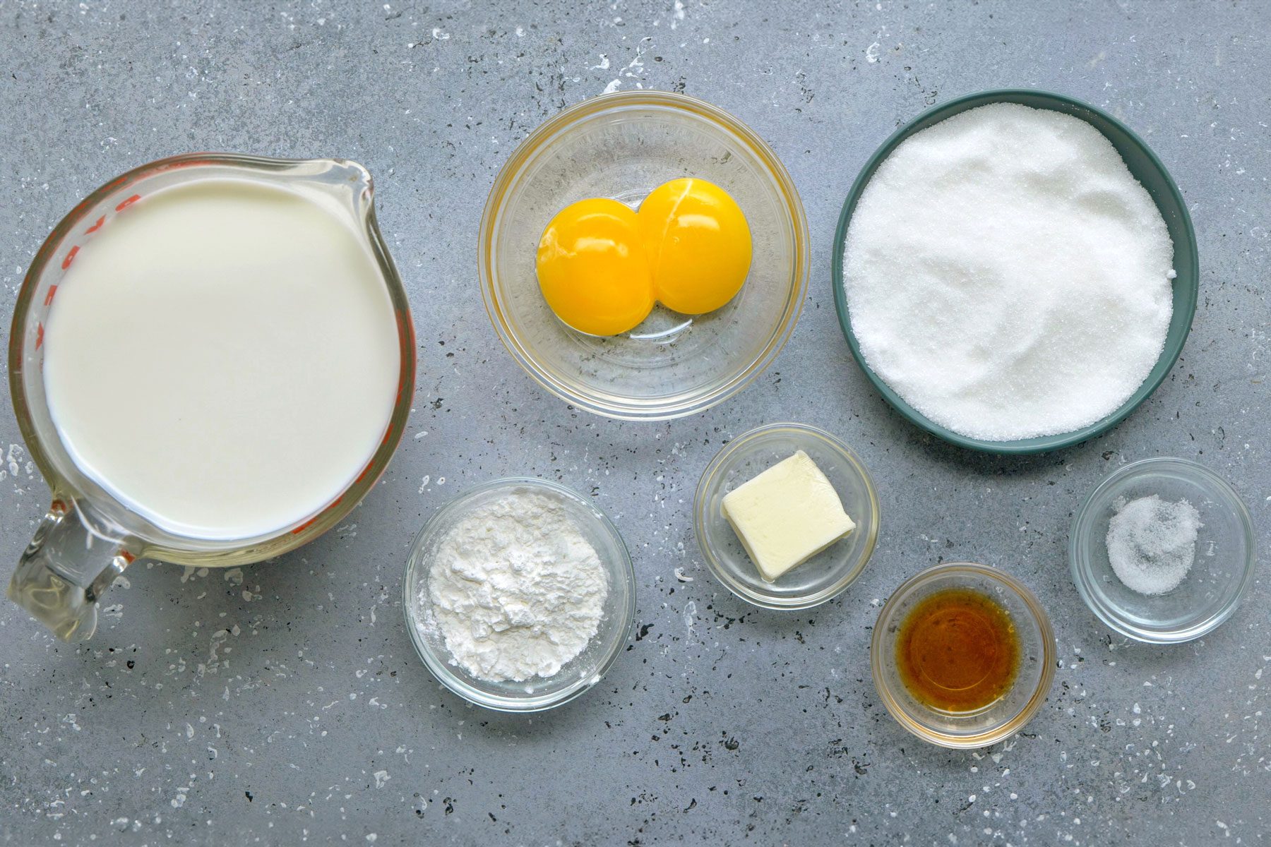Milk, sugar, cornstarch, egg yolks, vanilla extract and butter.