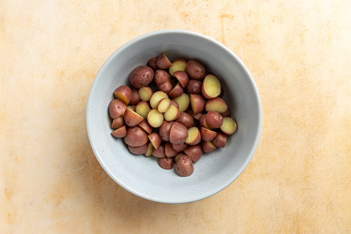 Taste of Home Vegan Potato Salad recipe photo of the cooked potatoes in a mixing bowl.