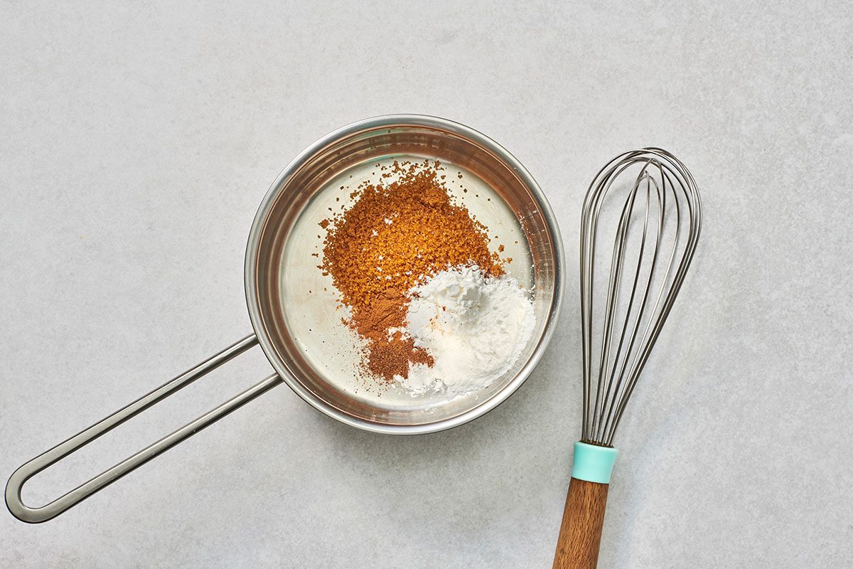 Combined brown sugar cornstarch allspice and nutmeg in a small saucepa