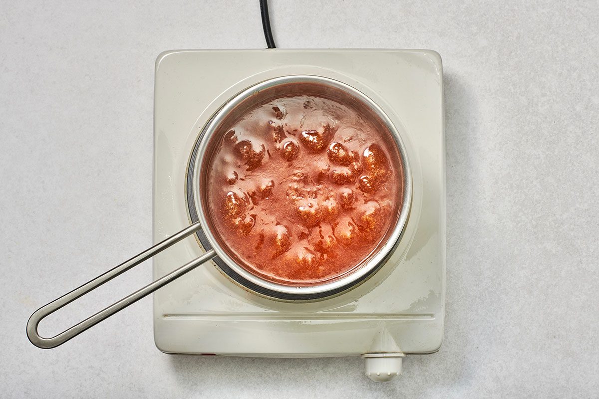 The syrup becomes bubbly and starts to thicken