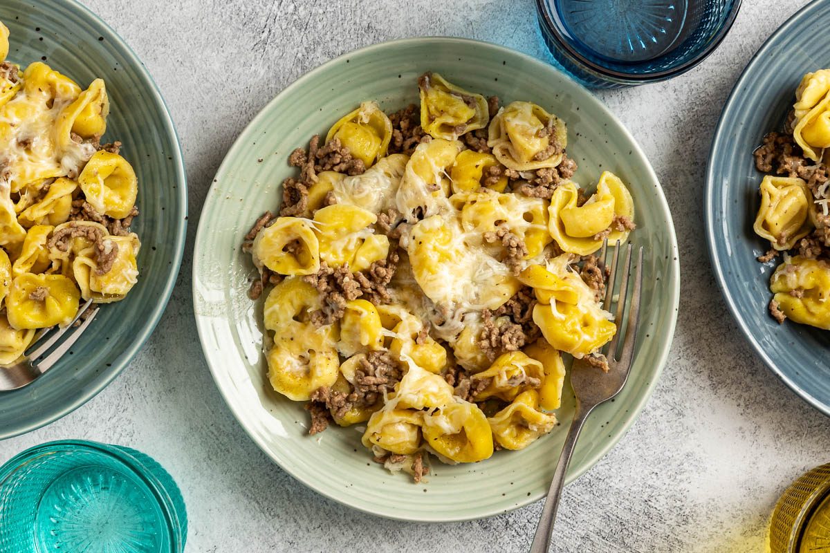 Taste of Home Beef Tortellini photo of the finished recipe served on plates.