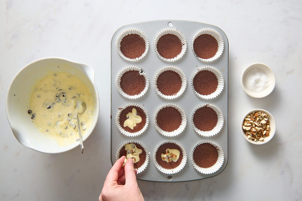 Filling the cupcake cases with batter