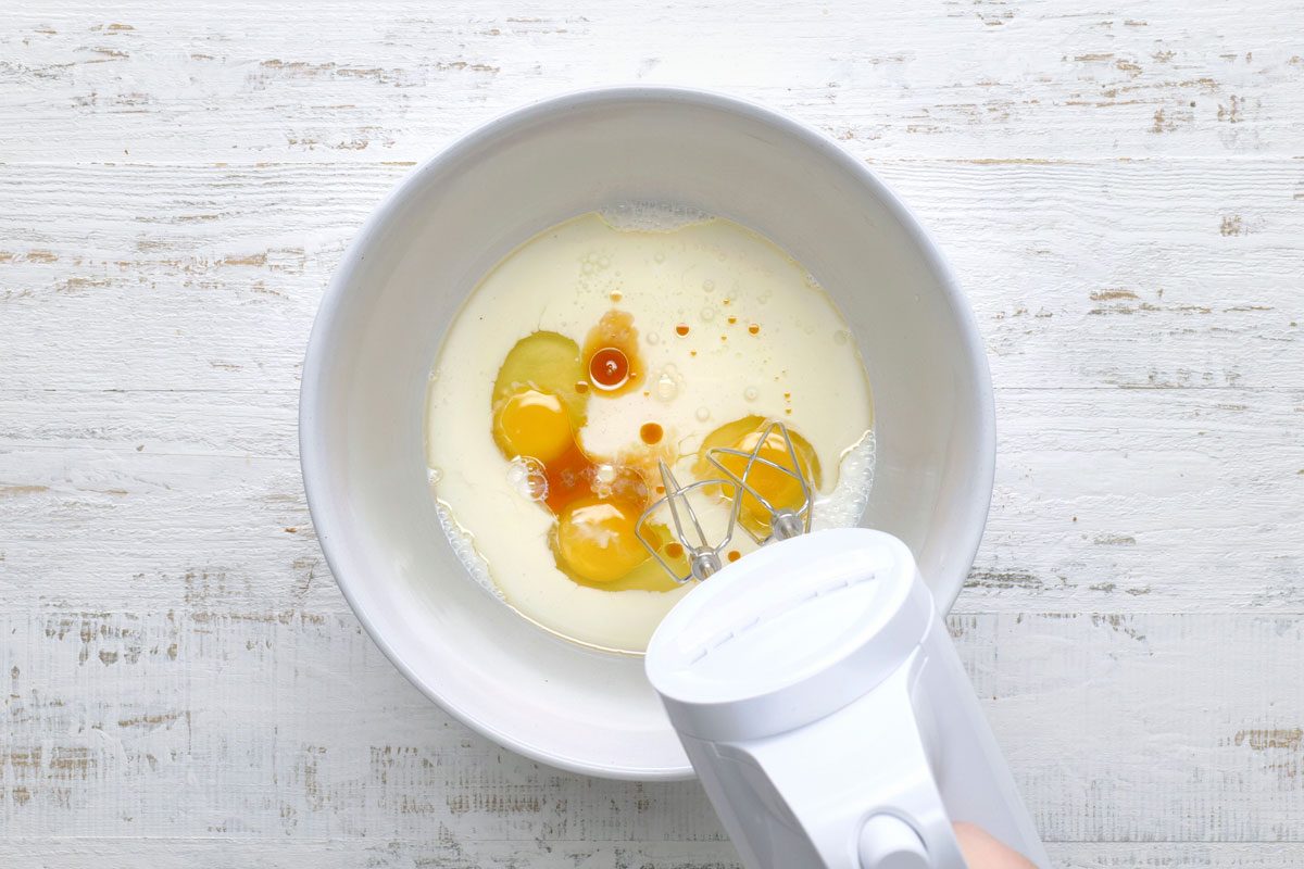 In A Large Bowl, Beat Milk, Eggs, Oil And Vanilla Until Well Blended.