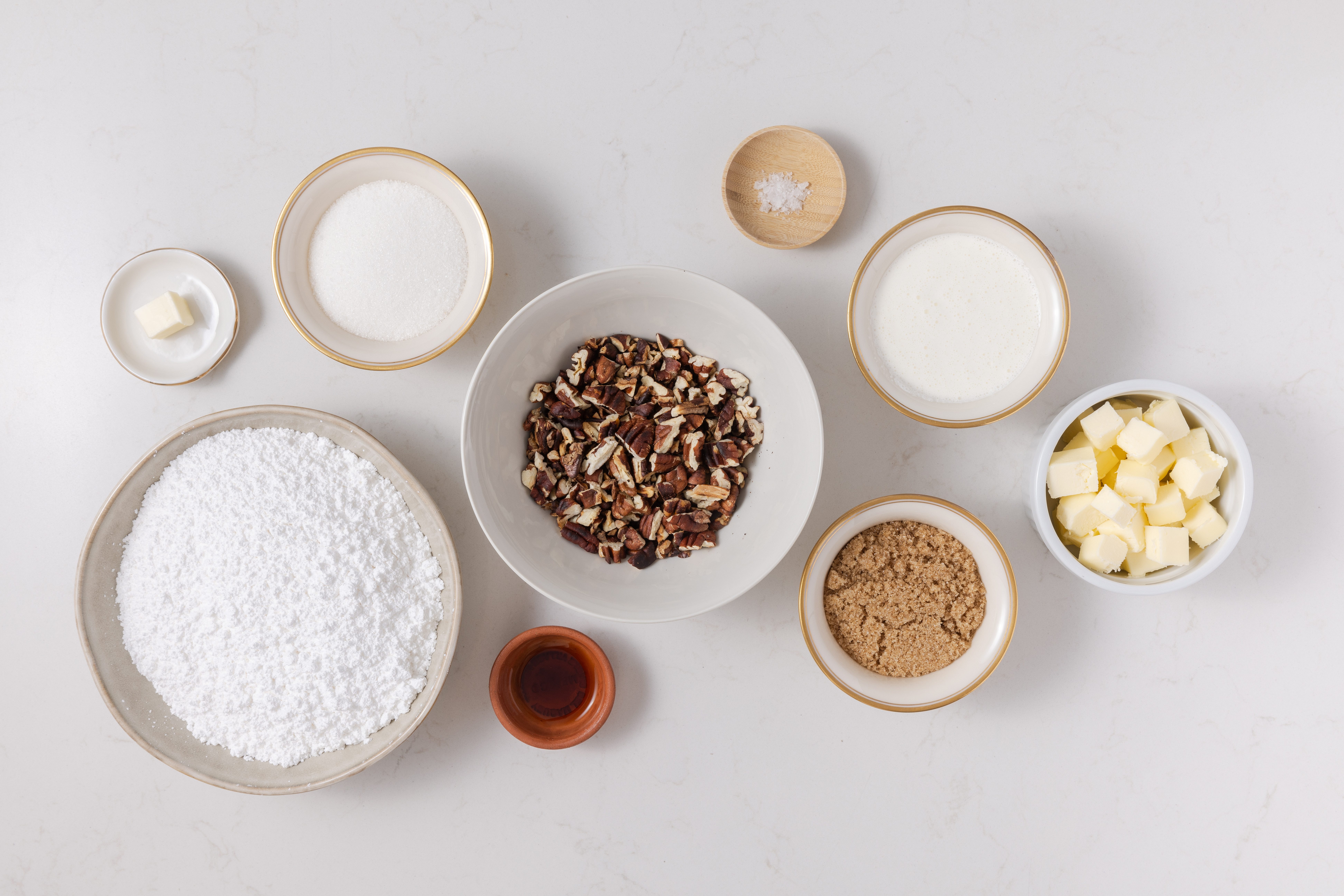 Ingredients for butter pecan fudge on kitchen counter.