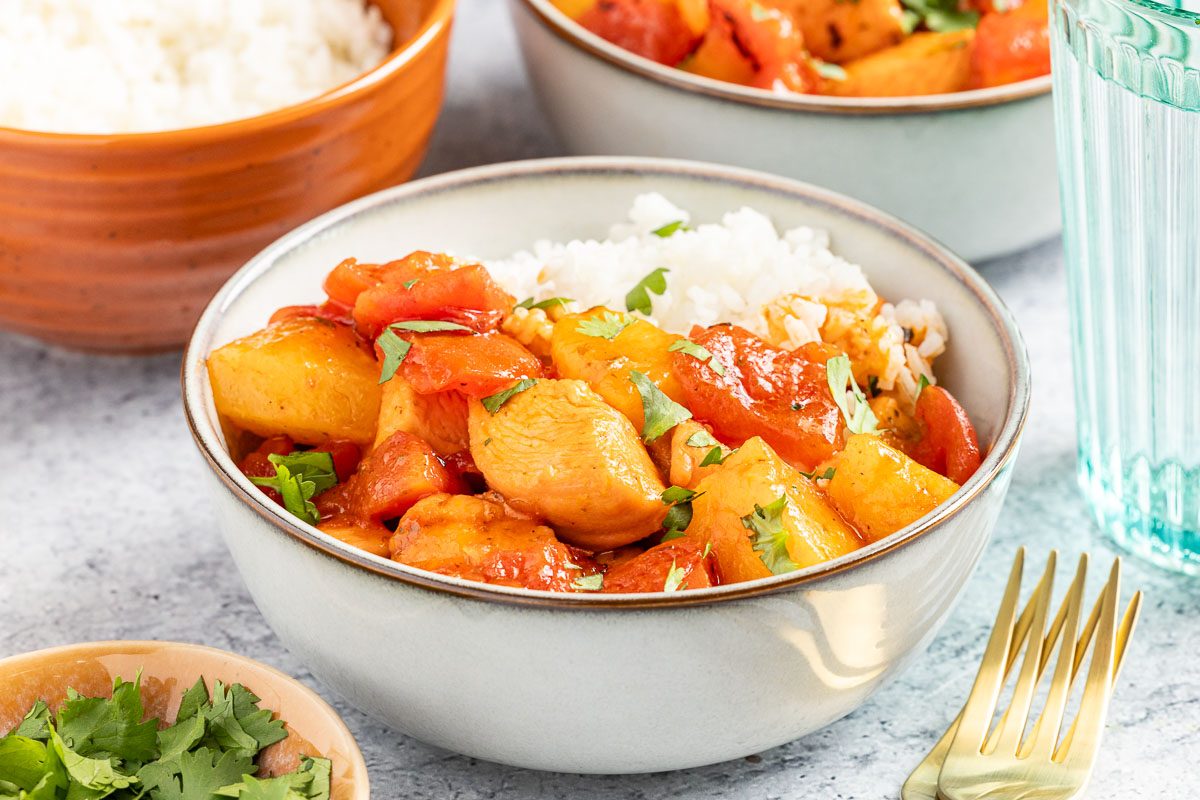 Caribbean Chicken with rice in a bowl