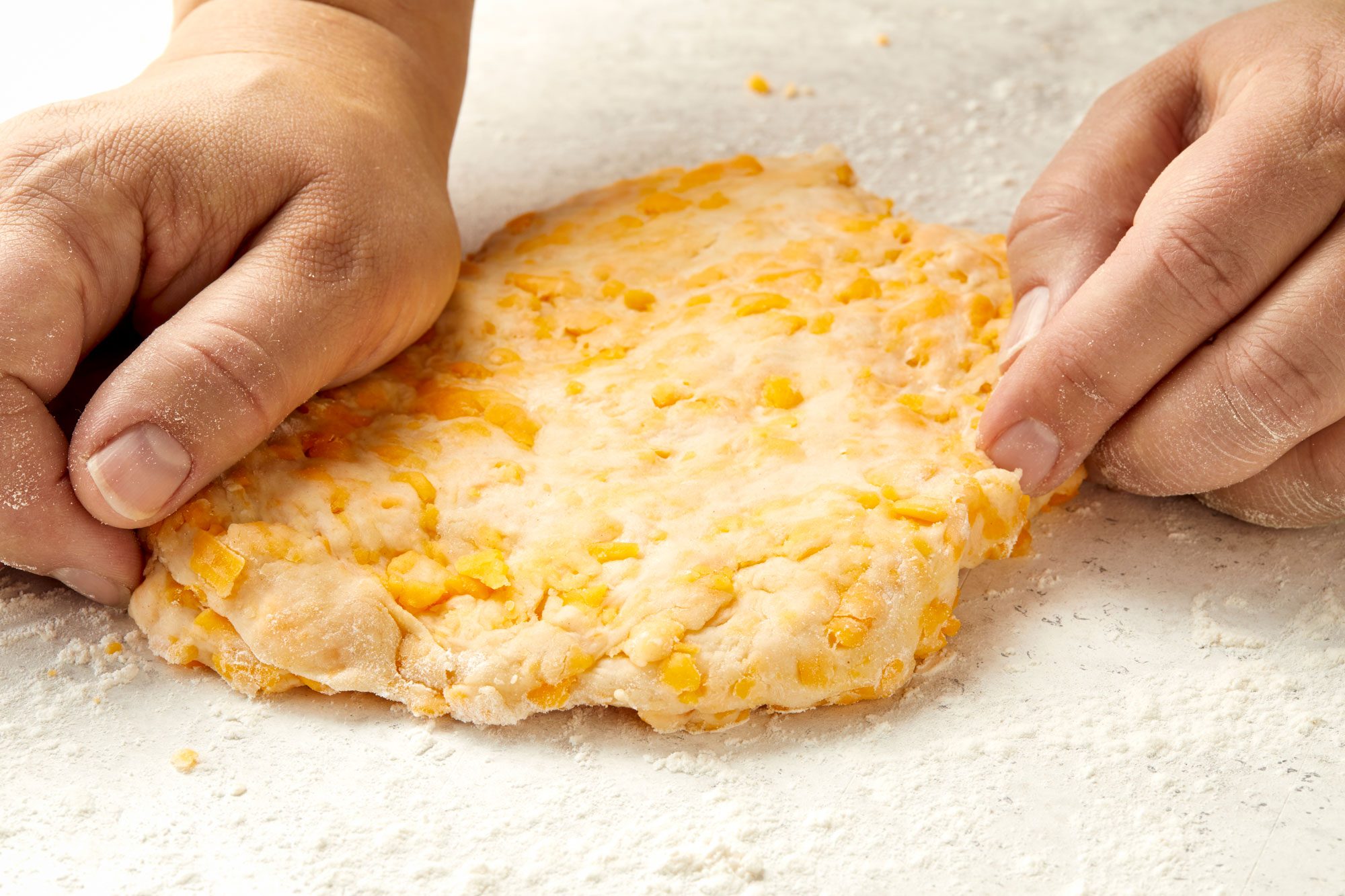 Turn onto a lightly floured surface; knead 8 to 10 times