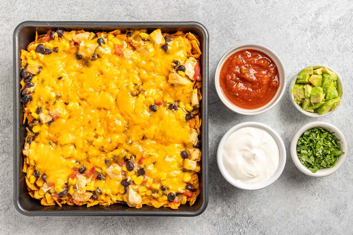 Taste of Home Chicken Doritos Casserole photo of the baked casserole with optional sides.
