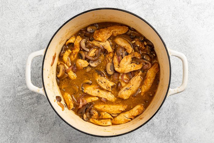 sauce with the chicken added back to the Dutch oven.