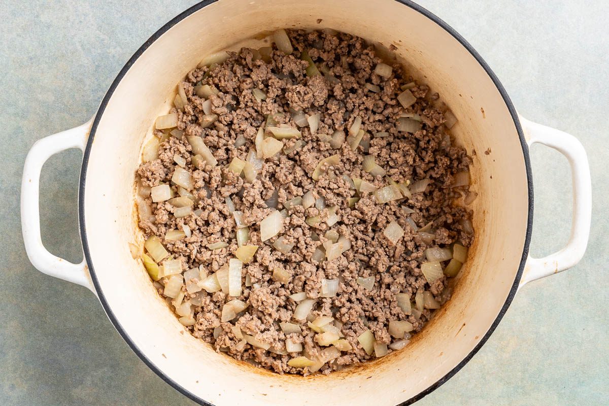 Taste of Home Chili with Cocoa Powder photo of the cooked meat and onion.