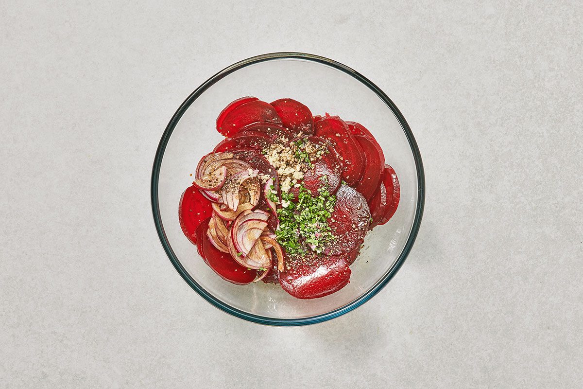 Salad ingredients in a bowl before mixing