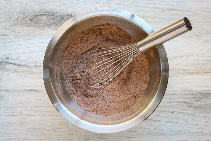 Dry ingredients for chocolate zucchini muffins, a Taste of Home muffin recipe.