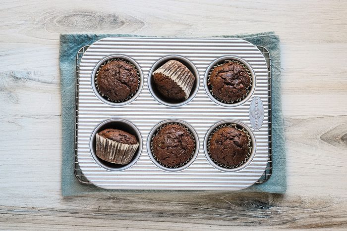 Baked homemade chocolate zucchini muffins fresh from the oven.
