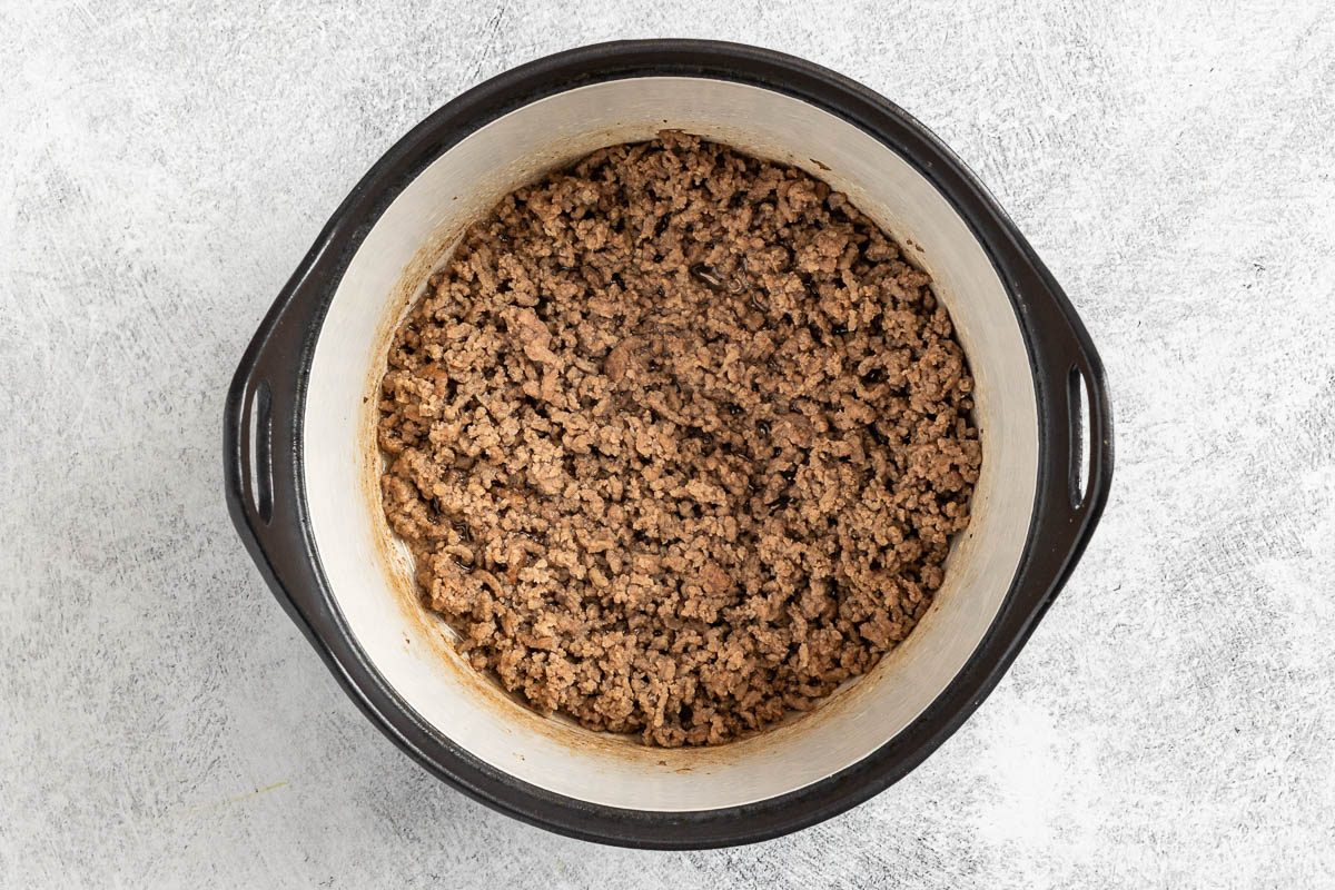 Taste of Home Coney Island Sauce photo of the cooked beef in a Dutch oven.