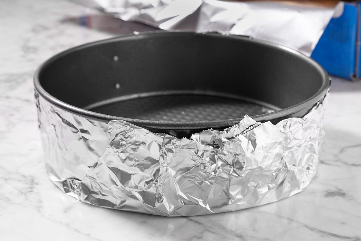 Securely Wrap 3 Layers Of Foil Around The Bottom Half Of The Pan