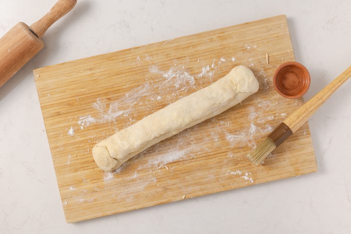Dough filled with almond paste mixture and sealed to form dutch letters.
