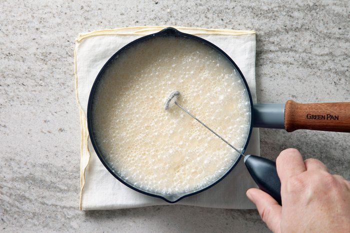 Whip the eggnog mixture with whisk