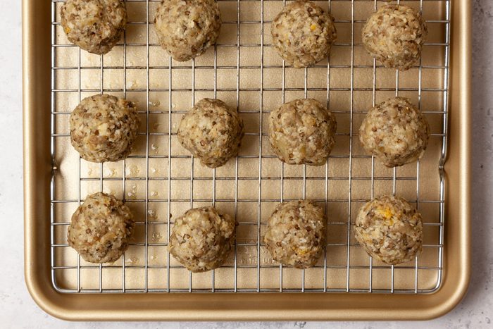 Step 4 of Taste of Home Eggplant Parmesan Meatballs is to form the meatballs and bake