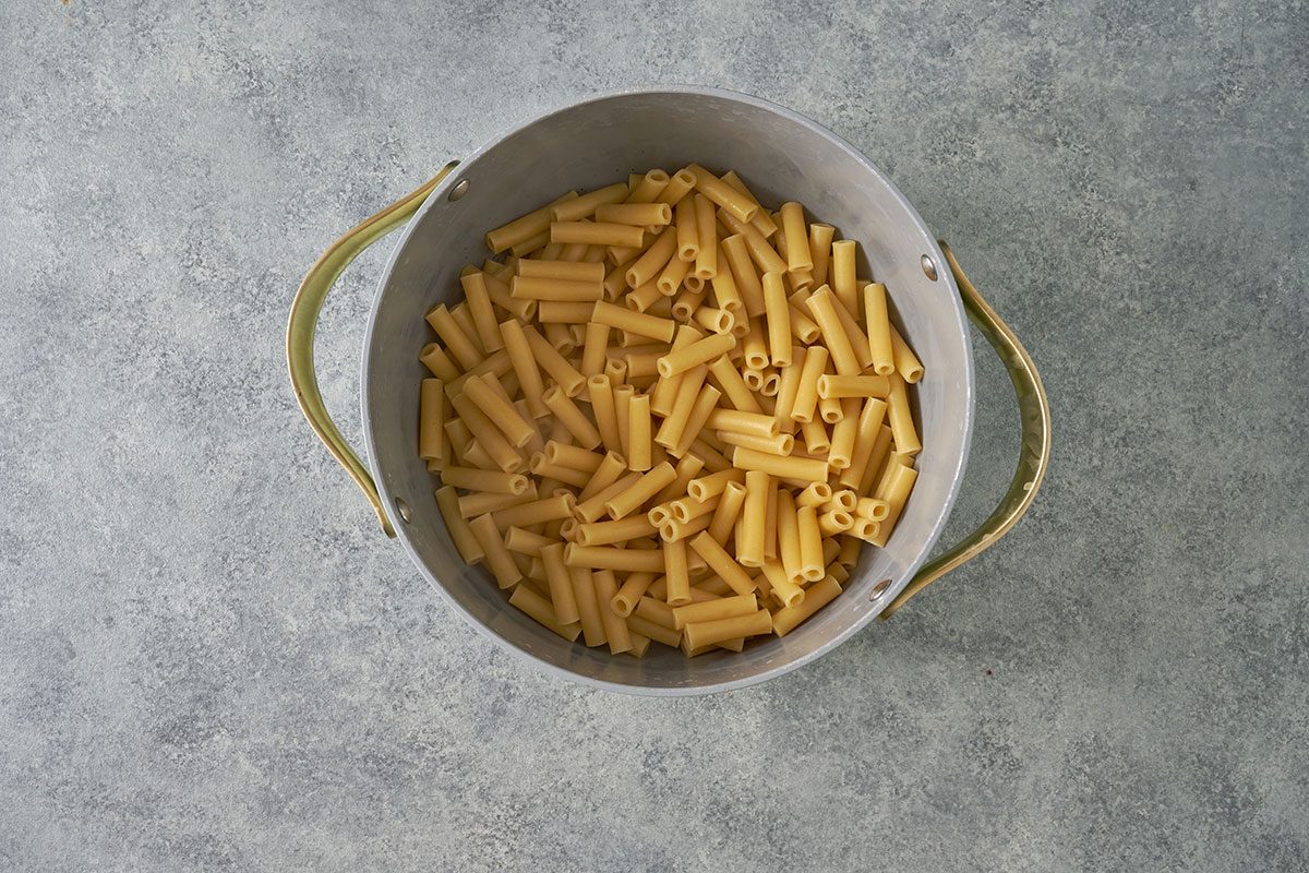 Preheat the oven to 350°F and cook the ziti al dente according to the package instructions for this delicious Five-Cheese Ziti by Taste of Home.