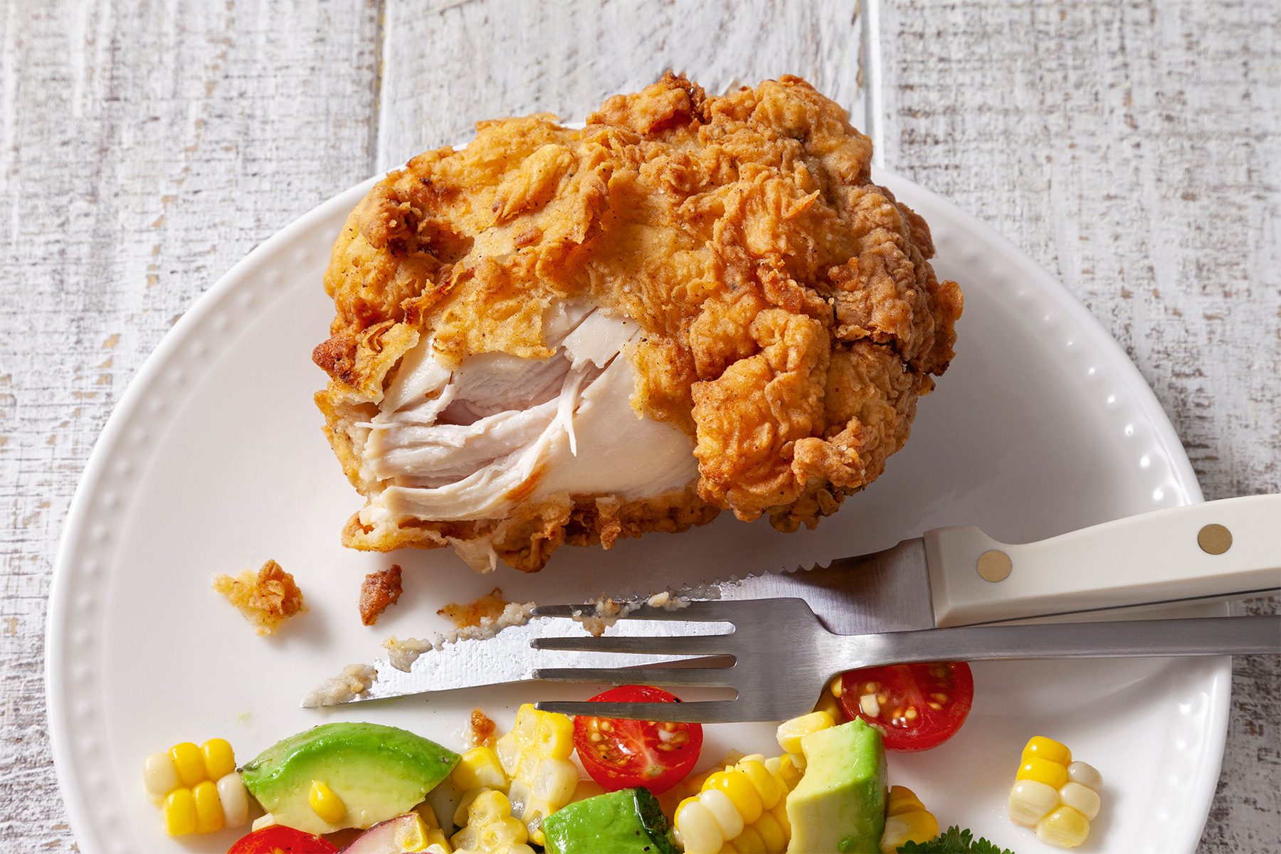 close shot of fried chicken thighs