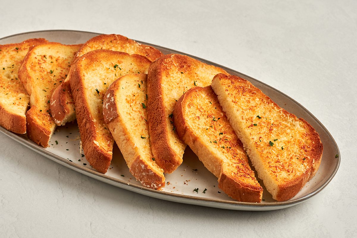 This garlic toast recipe by Taste of Home lets you make garlic bread with plain slices of sandwich bread.