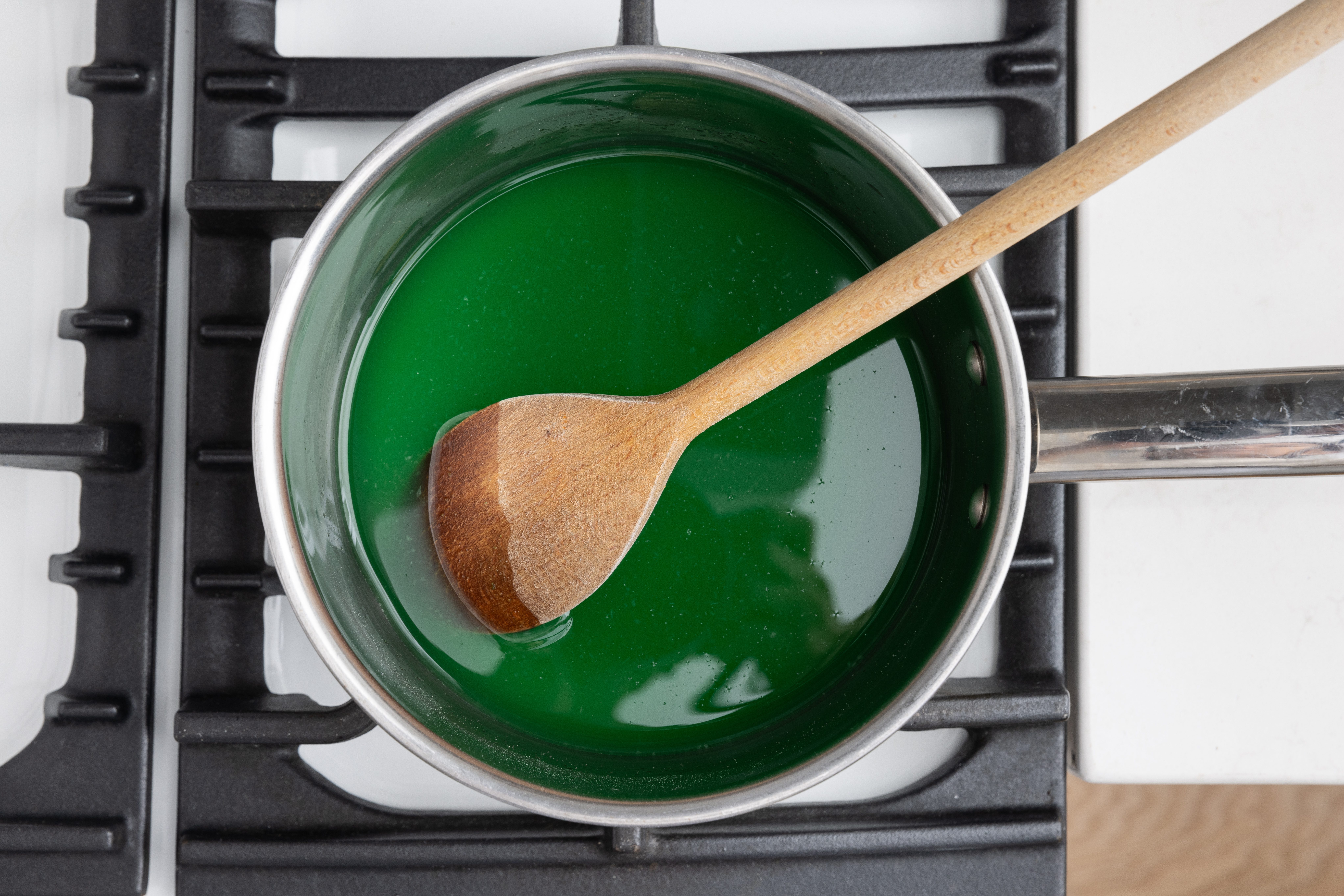 Lime gelatin dissolved in water and pineapple juice.