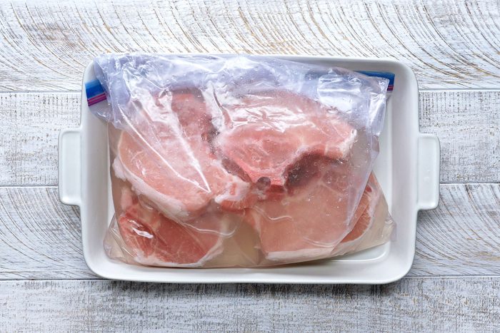 Pork chops in a large resealable bag.