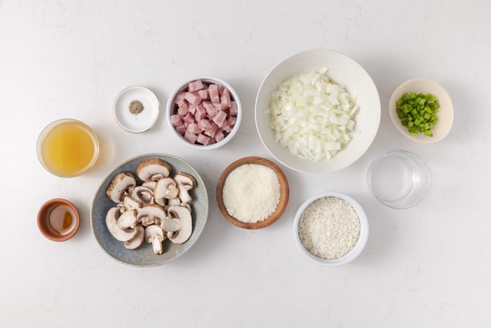 Ingredients for ham and rice on kitchen counter.